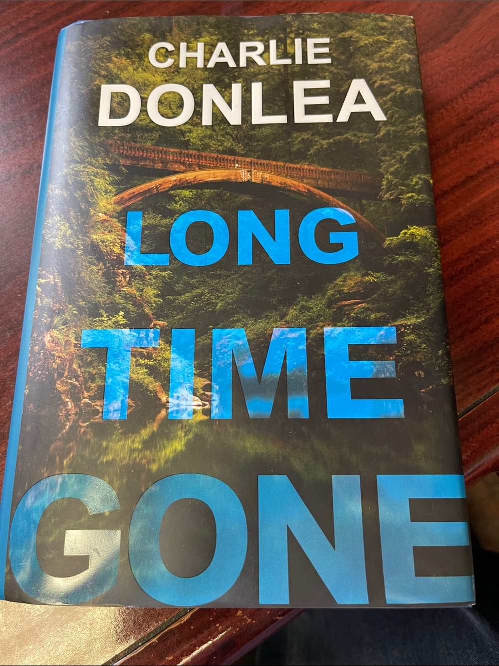 Long Time Gone by Charlie Donlea — Hardcover Novel in Blue/Green Cover